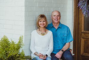 Mark and Risa Evans sitting side by side
