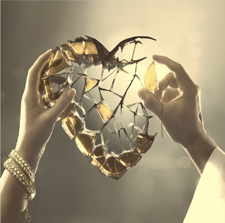 hands holding a heart